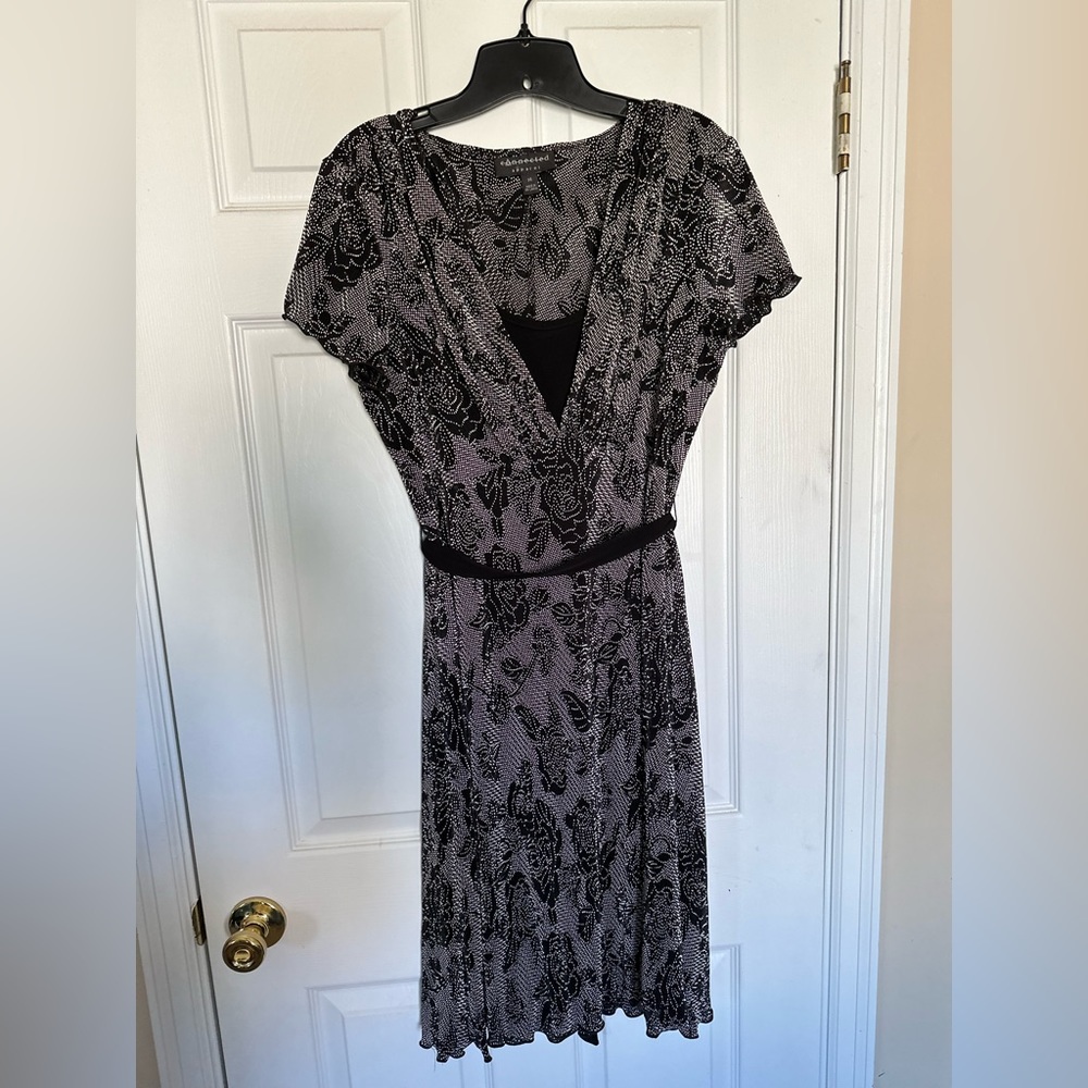 This is a size 14 black dress perfect for church